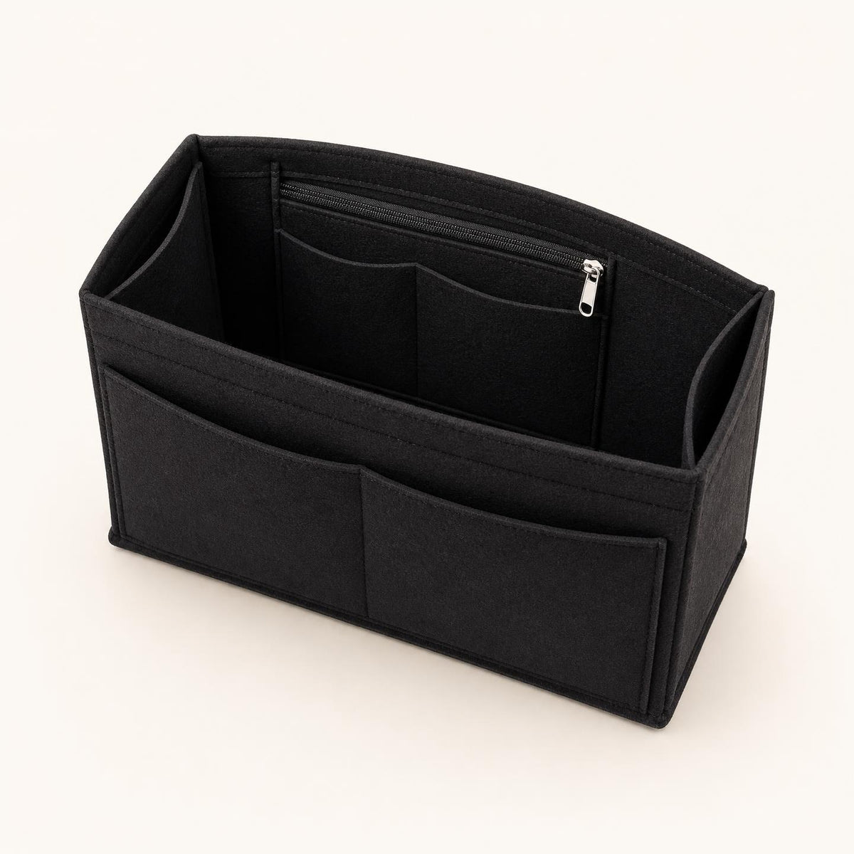 Organisateur de sac HomeTuck noir, vide : poches tout autour et poche zippée